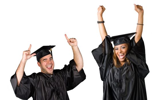 Two recent graduates posing in their caps and gowns isolated over white.