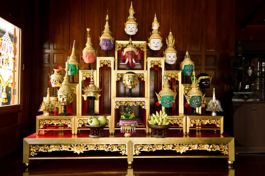 Khon Masks is situated on the set of altar table