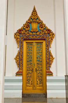 Traditional Thai style on door in temple Thailand