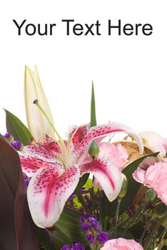 Closeup view of a lily bouquet with white copyspace above