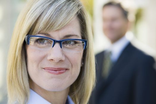 Portrait of a Pretty Blond Businesswoman Looking Away From Camera