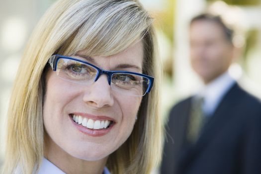 Portrait of a Pretty Blond Businesswoman Outdoors Looking Away From Camera