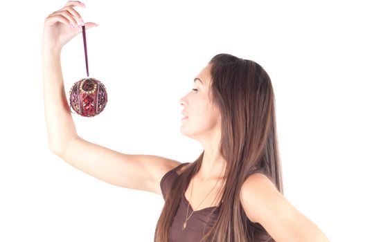 Studio shot of brunette woman with christmas decoration