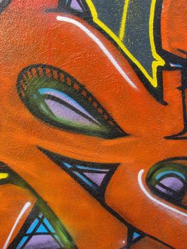 some detail of an abstract colored wall graffiti