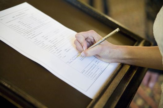 signing the wedding document after the wedding ceremony