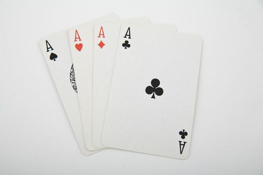 four aces - playing cards on light background