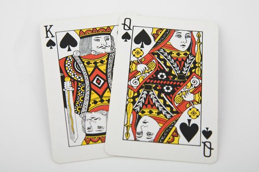 king and queen - playing cards on light background