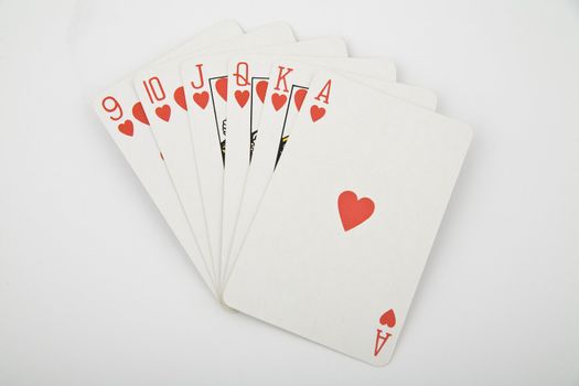 ace in waist - playing cards on light background