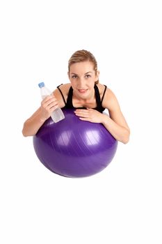 Young women with gym equipment and water isolated