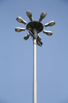 a street lamp on the blue sky