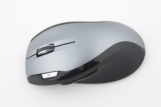 cordless computer mouse on very light background