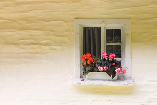 small rural window of house in Miedzygorze (Poland)