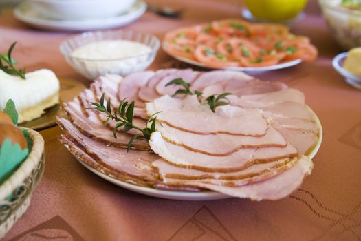 slices of ham on the easter breakfast