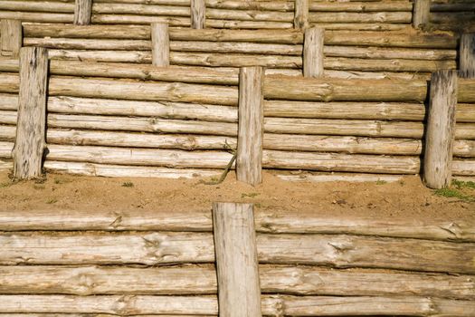 wooden bars - used as a protection against lowering the ground