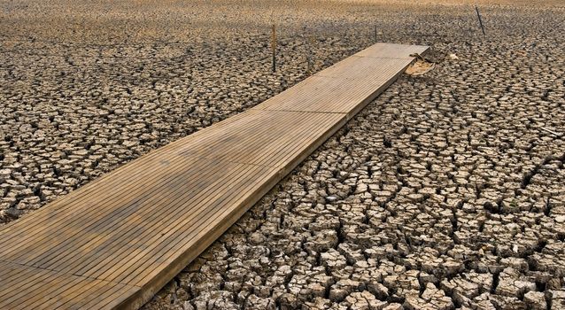 great image of a pontoon or jetty on a dry cracked lake bed