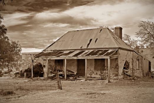 great image of old farmhouse ruins in sepia