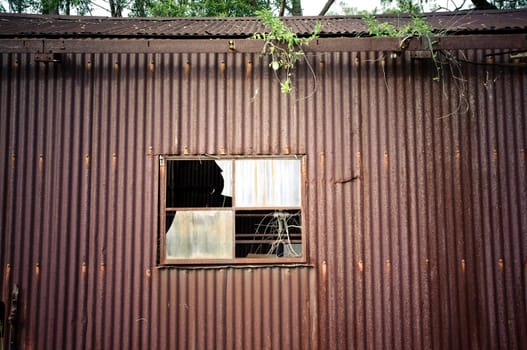 old rusty corrugated iron or tin shed building