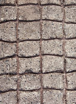 concrete with paved or cobblestone pattern in it