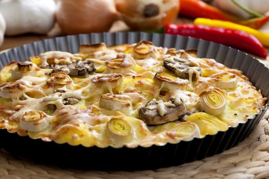 potato cake with champignons and leek