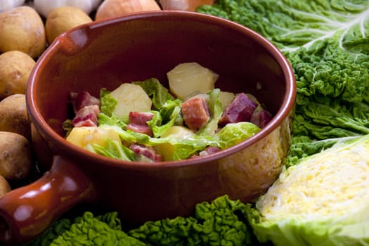 savoy cabbage with smoked meat and potatoes