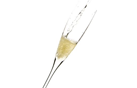 close up of an isolated glass cup of champagne