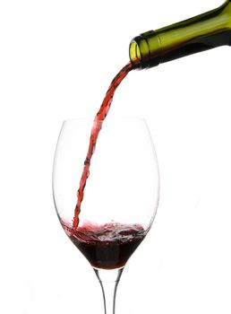 a clear glass of red wine isolated on white background