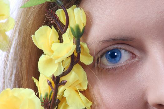 Portrait of the blue-eyed girl with yellow colours removed close up