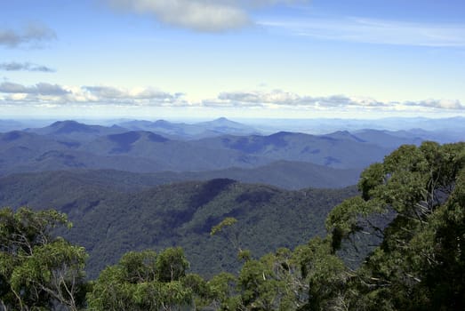 section of the view looking at the distant mountains (world heritage area) at point lookout with clouds at eye level