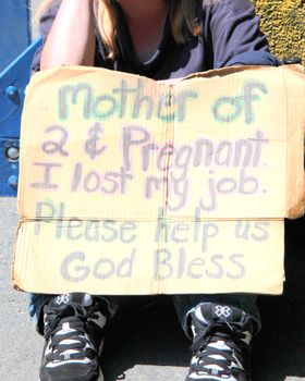 Homeless mother of two, jobless, and pregnant.