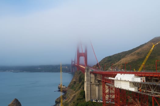 View of famous San Francisco Golden Gate bridge during cloudy day