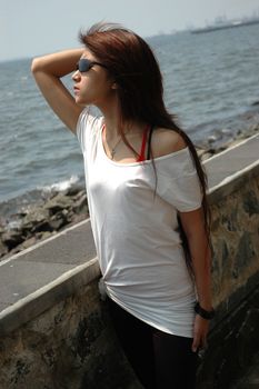 young asian lady wearing black sunglass