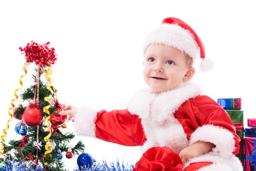 Beautiful toddler Santa with Christmas decorations