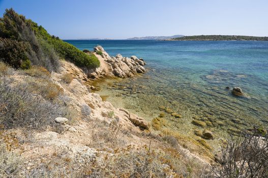 Mediterranean scrub vegetation and fantastic blue sea in Sardinia island - Best of Italy