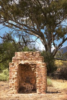 just a stone chimney is all that remains of the farmhouse