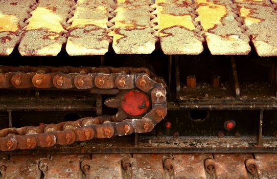 and old and rusty chain of a caterpillar