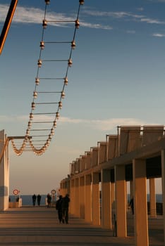 promenade on the dock at the sunset