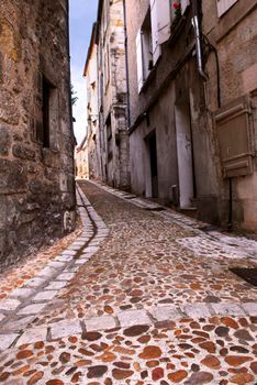 Narrow medieval street in town of Perigueux, Perigord, France