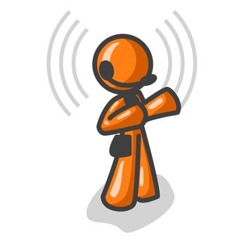 An orange man wearing a headset while talking.