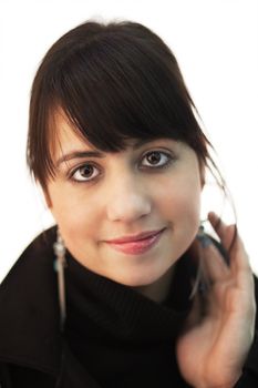 Portrait of smiling brunette girl; shallow dof