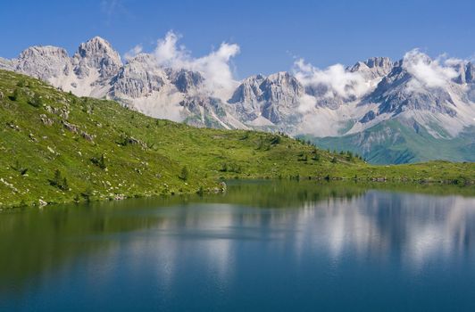 summer view of lake Cavia near San Pellegrino pass, Trentino, Italy 