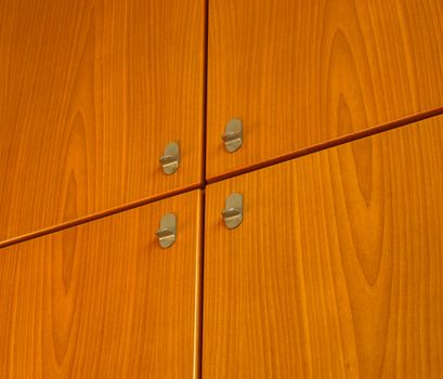 Detail of a wooden cabinet furniture background