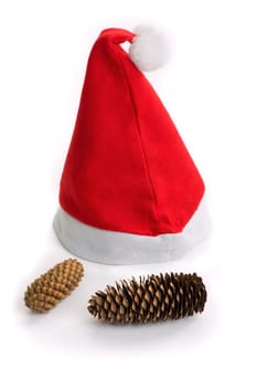 A red santa hat isolated with two cones