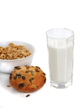 Breakfast with fresh loaf, whole grain cereals and milk
