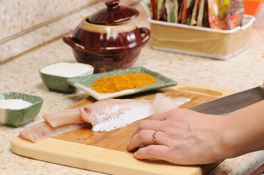 Meal preparation on kitchen from a fish