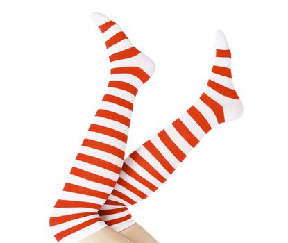 Christmas female legs, isolated on white background