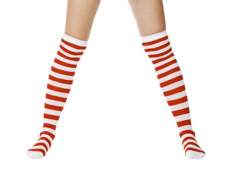Christmas female legs, isolated on white background