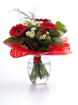 Flower bouquet with decoration in a vase