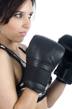 A sexy young hispanic woman wearing a gym outfit, isolated on a white background.