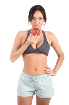 A sexy young hispanic woman wearing a gym outfit, isolated on a white background.