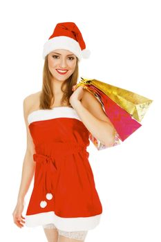 Shopping Christmas woman smiling. Isolated over white background